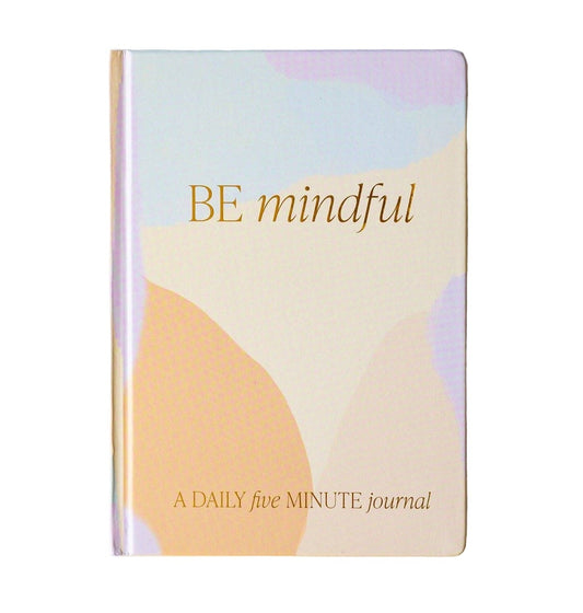 A pastel-colored fabric journal with gold foil details, titled 'BE mindfull' on a white background.