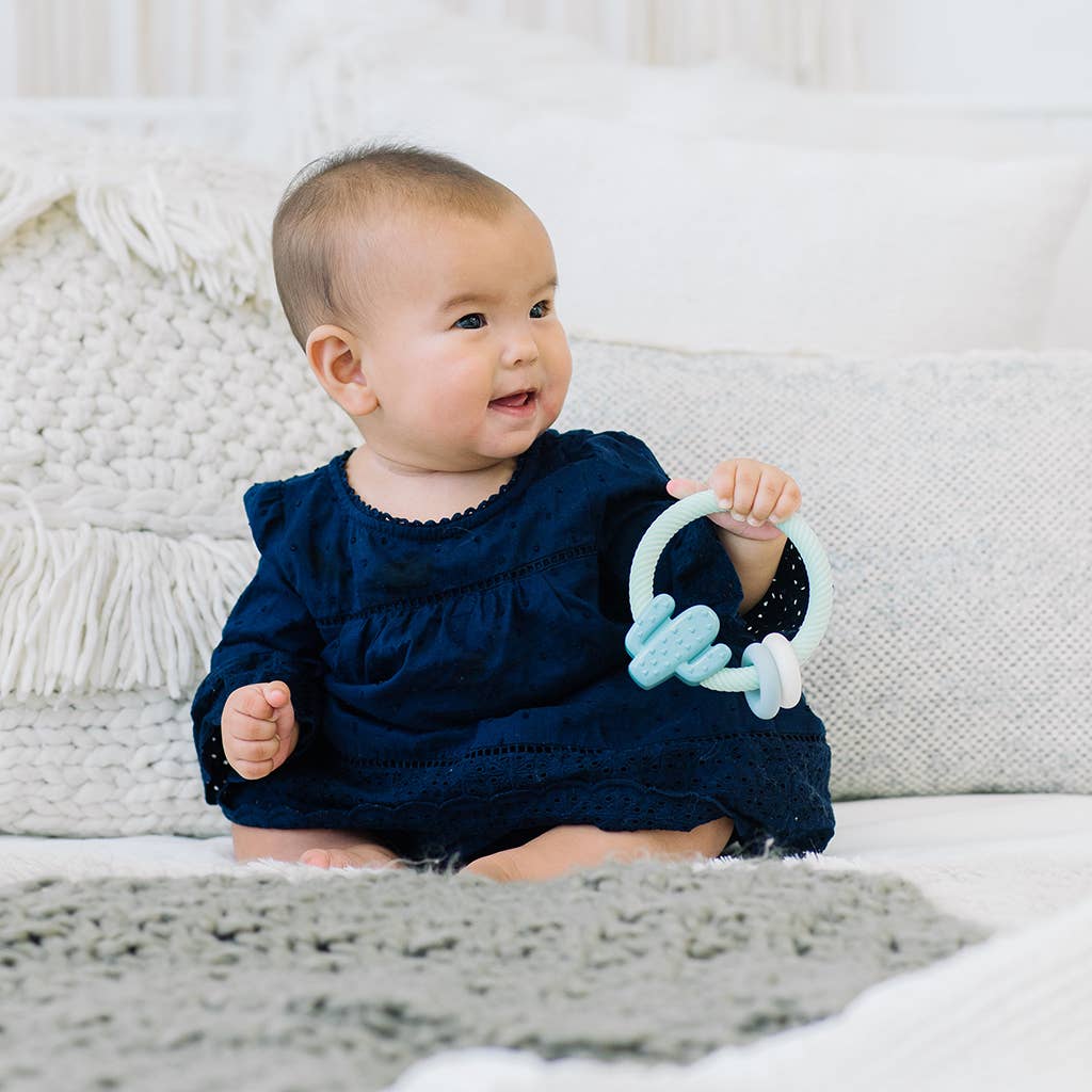 Ritzy Rattle™ Silicone Teether Rattles - Highland Cow