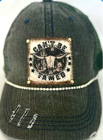 Can't Be Tamed Distressed Trucker Hat