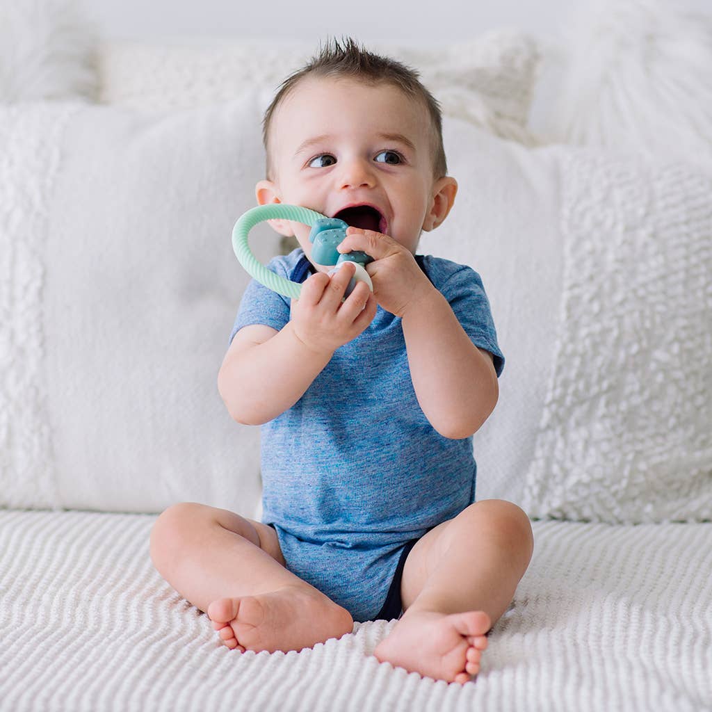 Ritzy Rattle™ Silicone Teether Rattles - Highland Cow