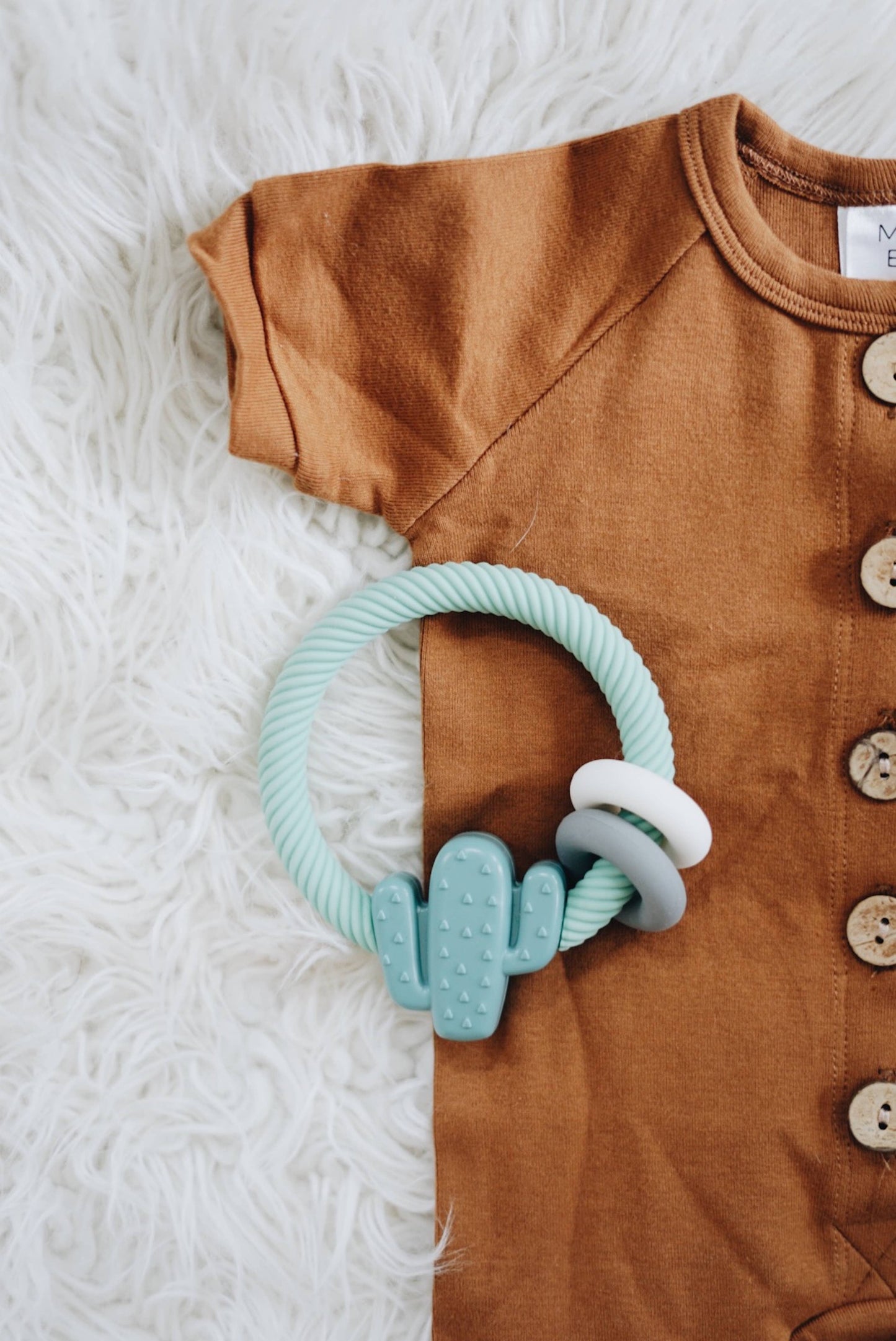 Ritzy Rattle™ Silicone Teether Rattles - Highland Cow
