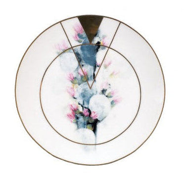 A ceramic trinket tray with metallic gold foil embellishment, featuring a floral pattern with cactus flowers in a vase design.