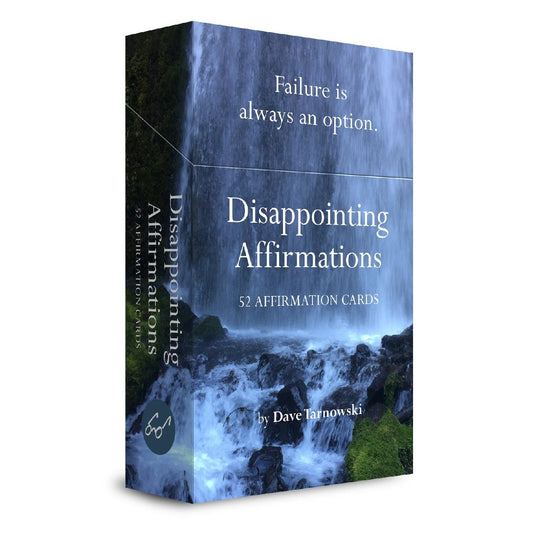 A boxed card product titled "Disappointing Affirmations" with the subtitle "52 Affirmation Cards," shown at a slight angle on a white background. The box features a waterfall and rocky landscape photo, with white text and a small circular "sg" mark near the bottom front.