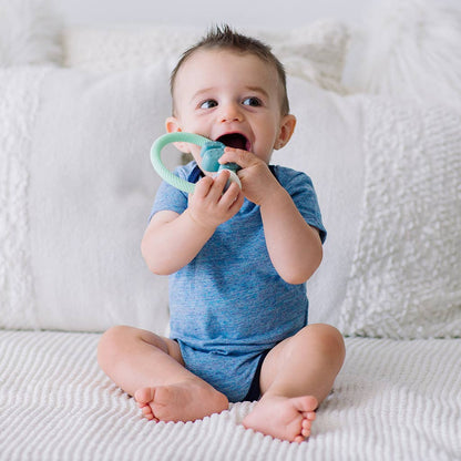 Ritzy Rattle™ Silicone Teether Rattles - Highland Cow