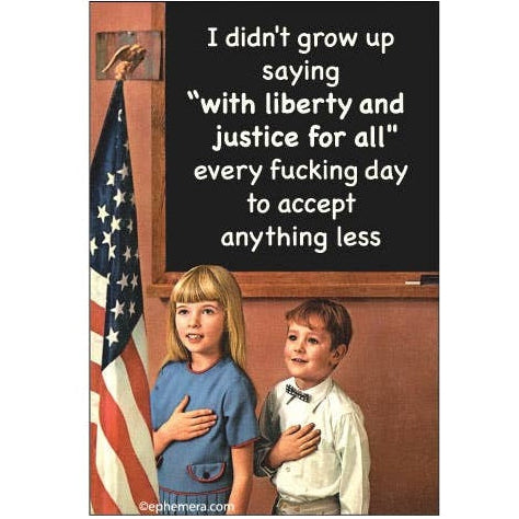 Children pledging allegiance to the flag with a quote on a blackboard.